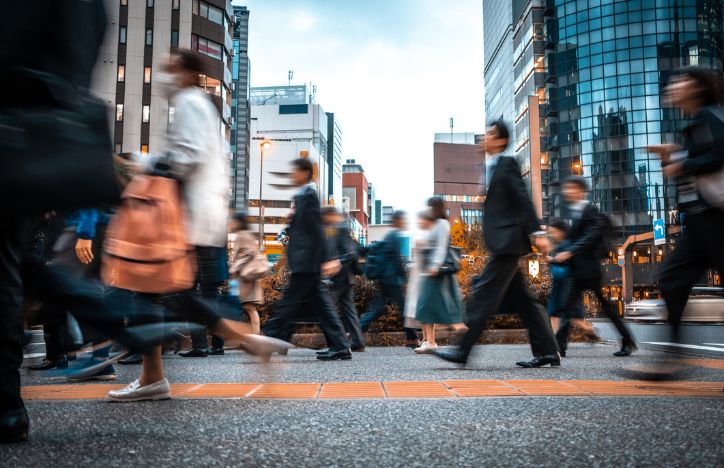 Blurred People Walking In A City