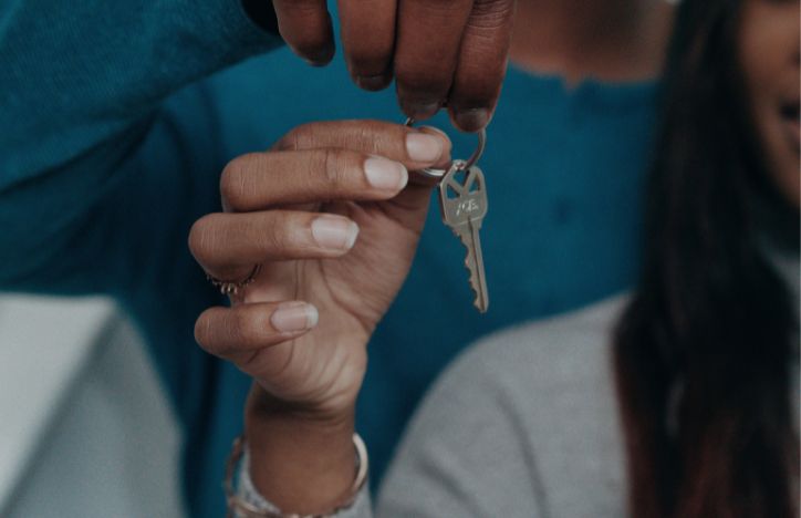 Couple holding house key.jpg