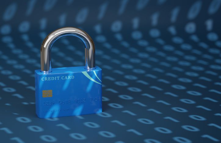 Credit Card In The Shape Of A Closed Padlock On A Background Of Binary Code