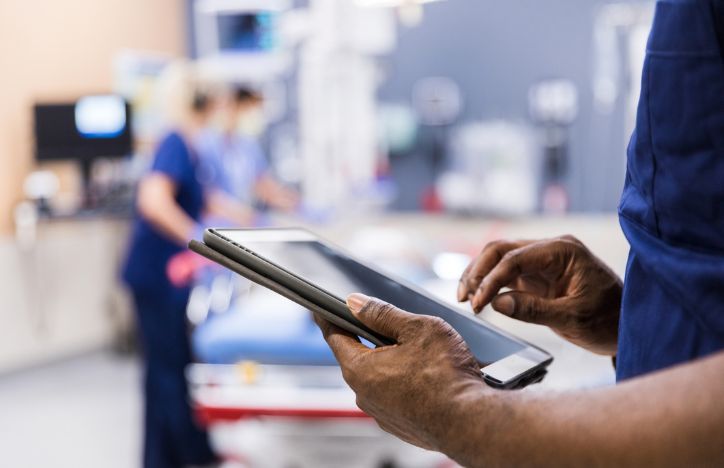 Healthcare Professional Using A Tablet