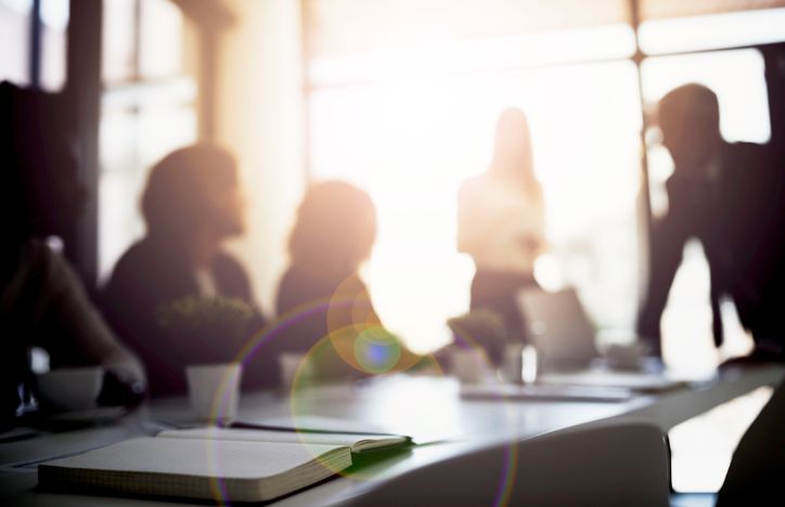 Office Meeting With Five People Out Of Focus