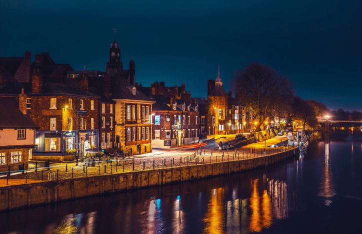 A Street By A River At Night