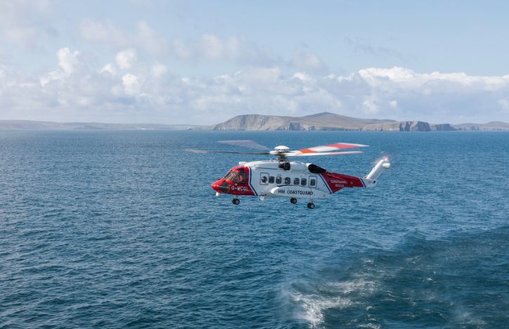 HM Coastguard Helicopter Flying Over Water