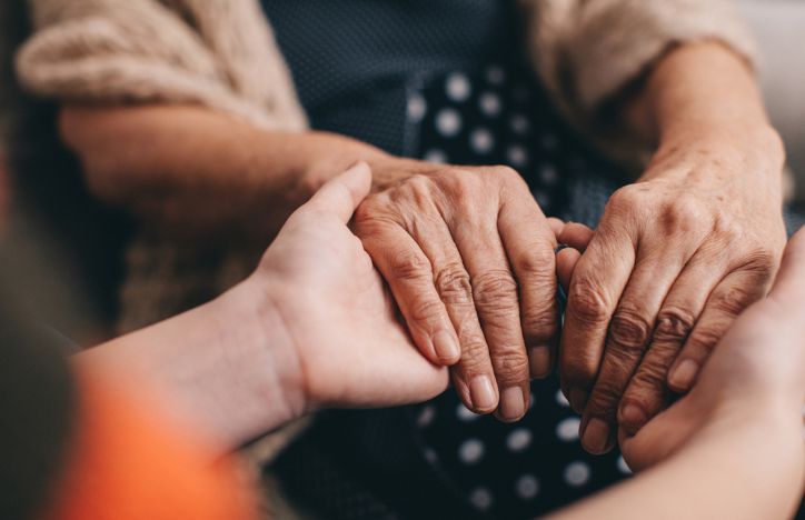 Holding Elderly's Hands