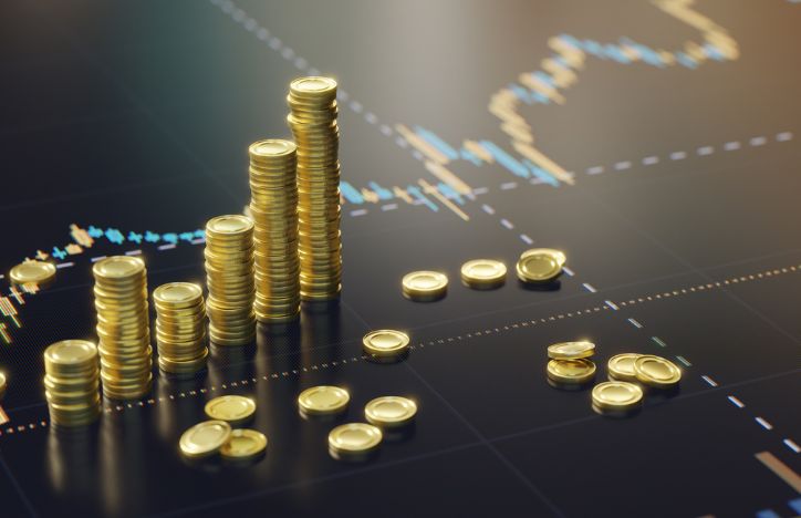 Gold Coins On A Financial Chart Background