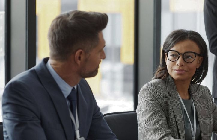 People In Conversation In Business Meeting