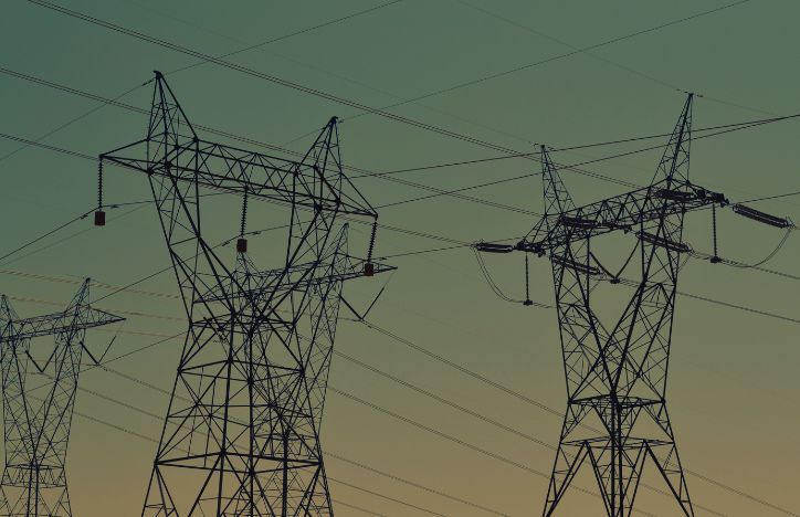 Electricity pylons against a clear sky.jpg