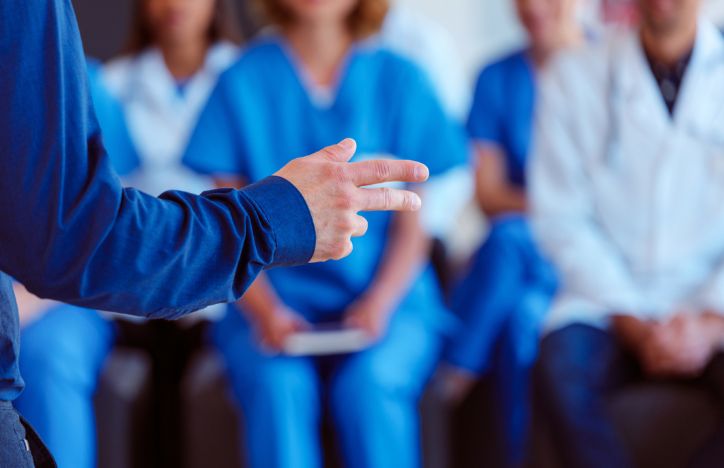 Healthcare Staff Listening To Presentation