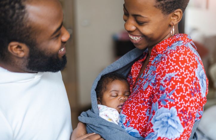 Parents Holding Baby