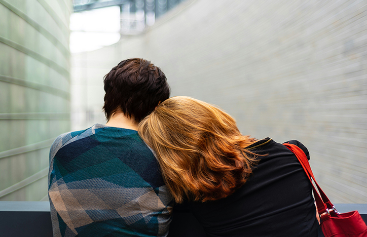 Woman Leaning On Friend