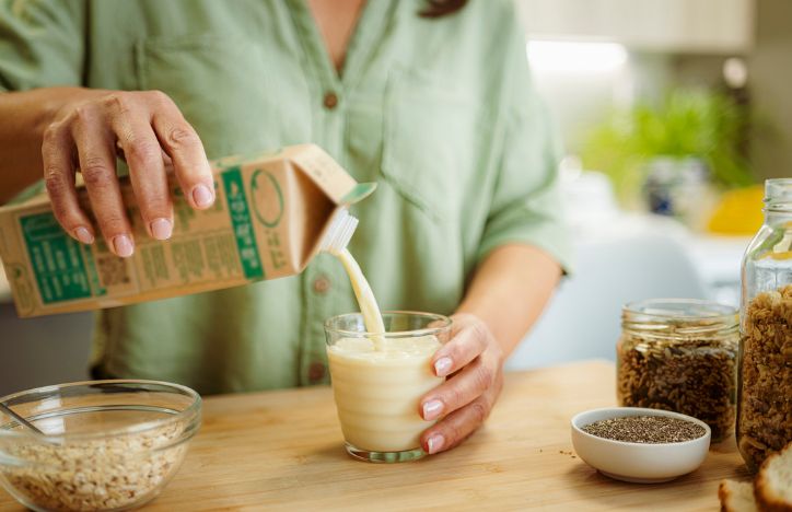 Pouring A Glass Of Plant Based Milk