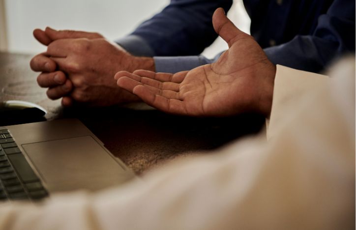 Close up of hand gesutres during a meeting.jpg