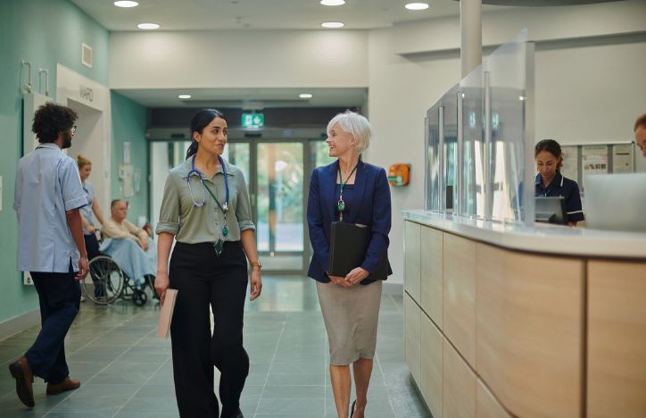 Medical Professionals Walking Through Hospital