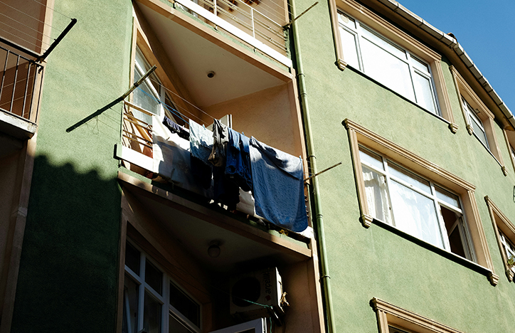Photo Of A Balcony From The Street, With Washing Hanging Outside