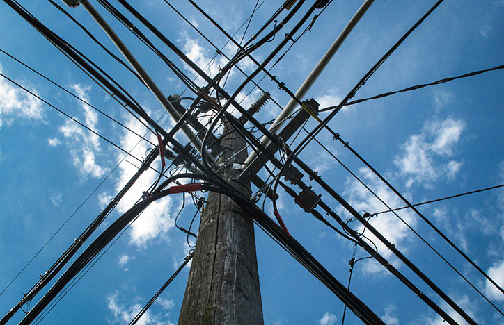 Electrical Pole With Wires Connecting From All Angles